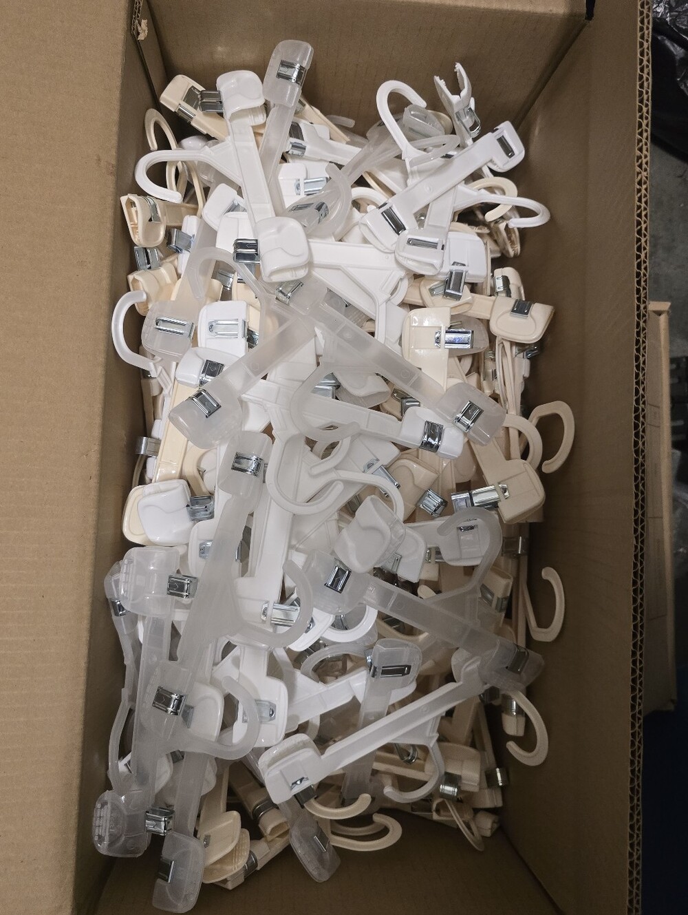 Clear and Beige Clip Hangers